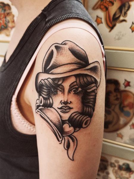 Traditional woman with hat tattoo by @flashntatz