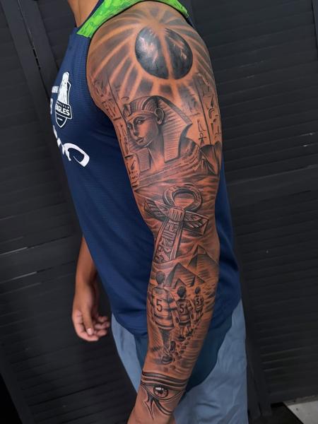 Black and grey realism egyptian sleeve tattoo by @jaydentattoos