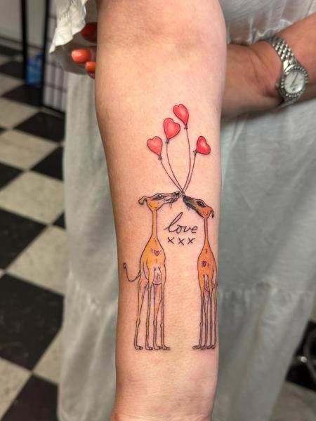 Illustrative dogs with balloons tattoo by @jem_lou_tattoo