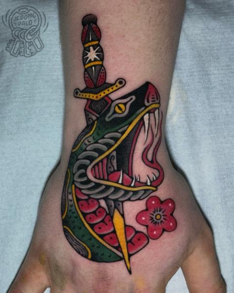 Traditional snake and dagger tattoo by @jerome_palo
