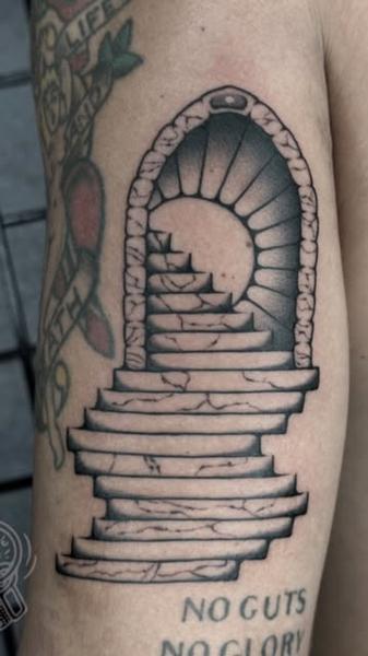 Traditional stone staircase tattoo by @jerome_palo