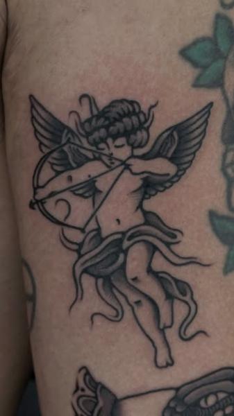Traditional cupid tattoo by @jerome_palo