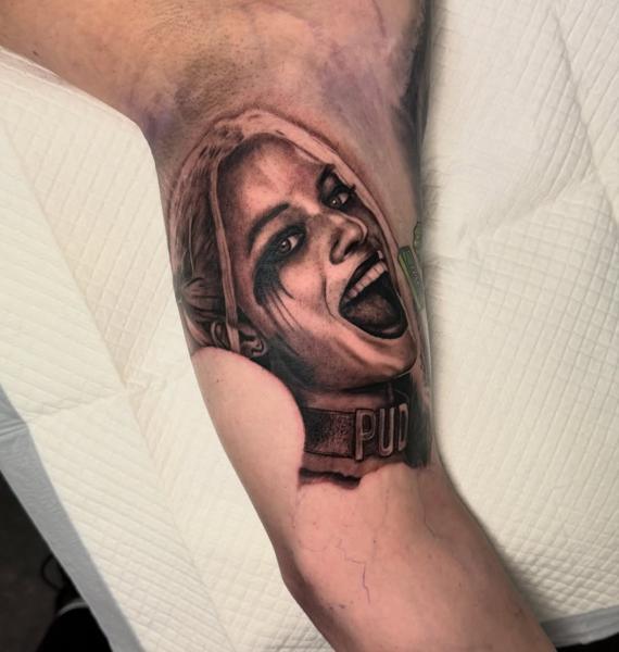 Realism smiling character tattoo by @jess_dias_tattoos