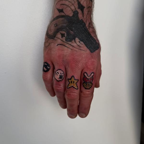 Pixel art pixel art characters tattoo by @jess_dias_tattoos