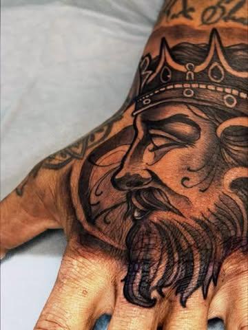 Illustrative blackwork crowned king portrait tattoo by @jimi.james.tattoos