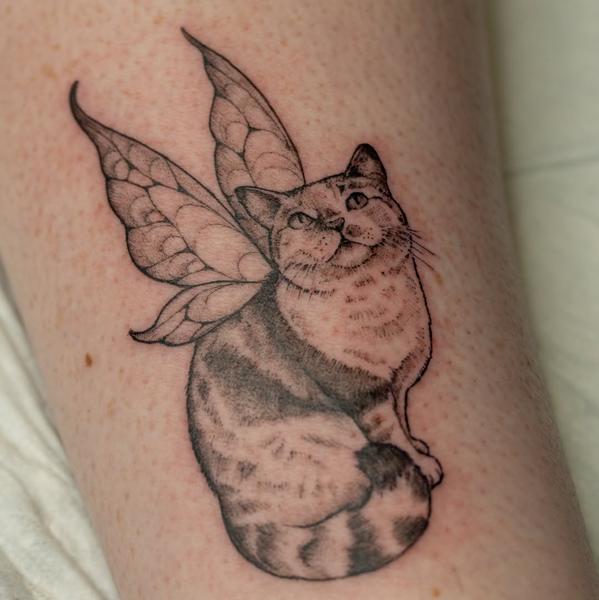 Fine line fairy cat tattoo by @jimi.james.tattoos