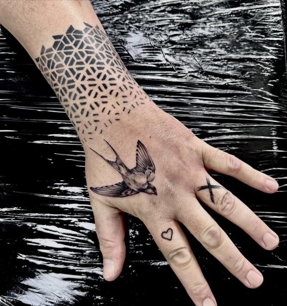 Fine line flying bird tattoo by @jim.tat