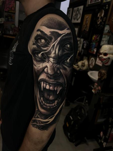 Realism vampire face tattoo by @joe_cider
