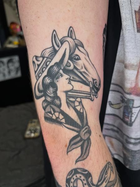 Traditional cowgirl and horse tattoo by @joegarey_tattoo