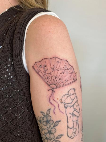 Fine line floral fan tattoo by @joelclementstattoo