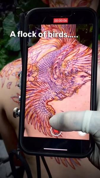 Illustrative flock of birds tattoo by @joharrison_tattoo