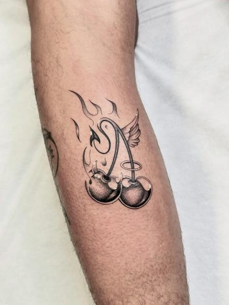 Illustrative flaming cherries tattoo by @outofprison_