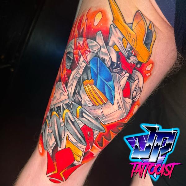 Anime robot character tattoo by @heartanddagger.tattoo