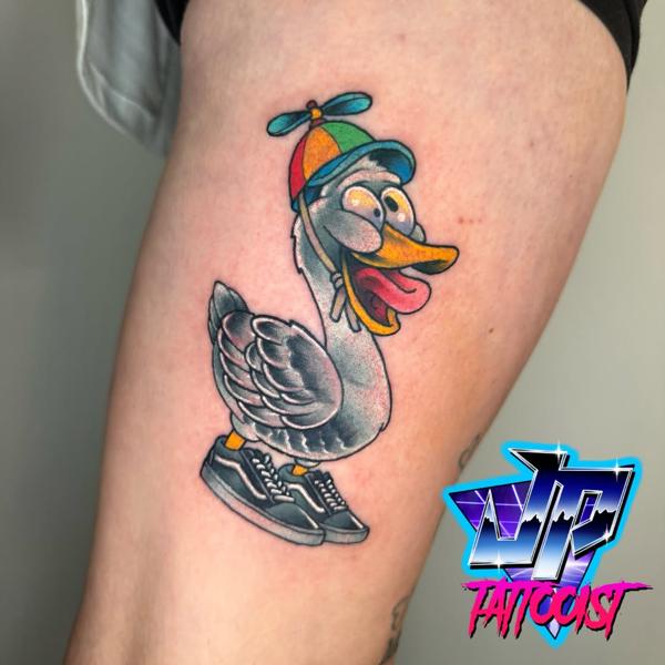 Cartoon cartoon duck tattoo by @heartanddagger.tattoo