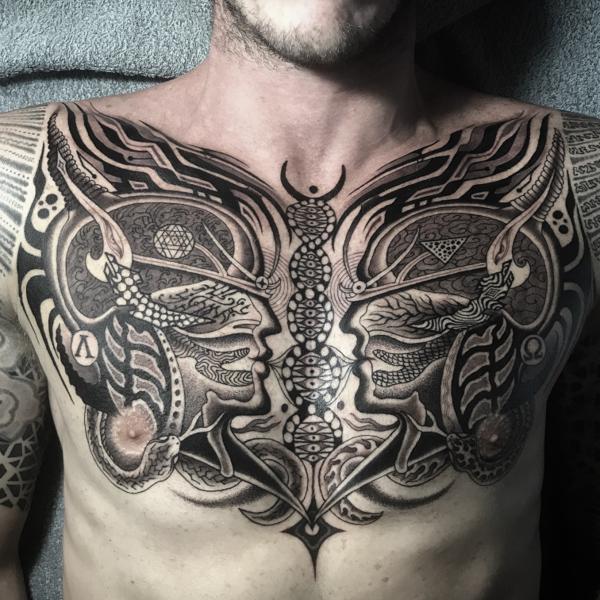 Blackwork abstract faces tattoo by @jondix