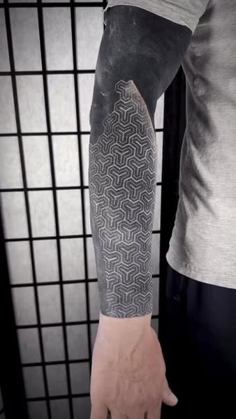 Blackwork geometric pattern tattoo by @jonnyransomtattoo