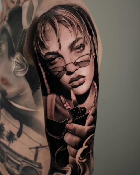 Realism woman with lighter tattoo by @jordanferristattoo