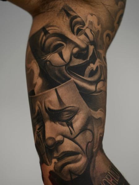 Realism comedy tragedy masks tattoo by @jordanferristattoo
