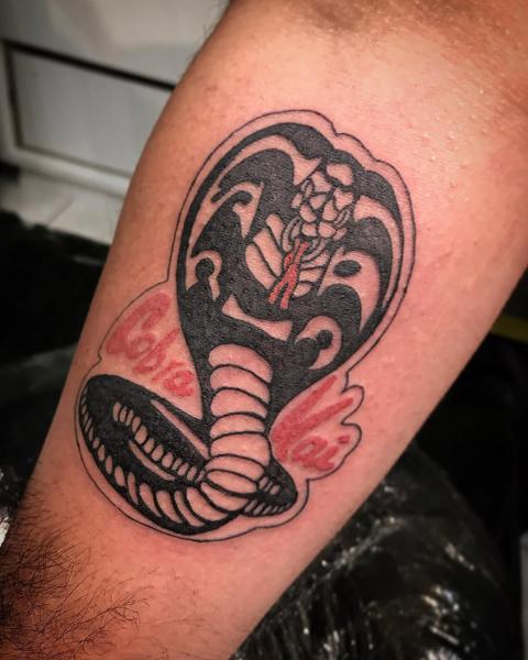 Illustrative cobra logo tattoo by @ztattoofloripa