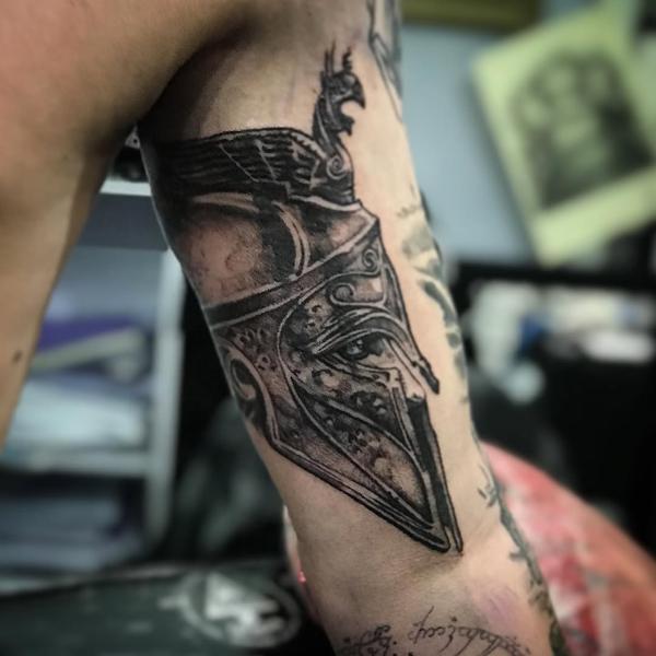 Realism spartan helmet tattoo by @ztattoofloripa