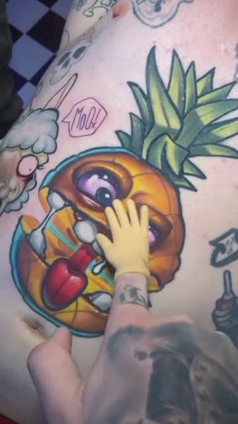 New school cartoon pineapple tattoo by @joshhermantattoo