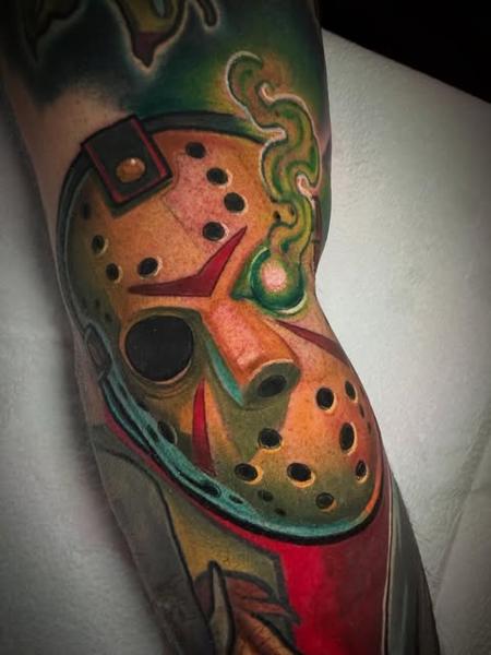 Realism hockey mask tattoo by @joshhermantattoo
