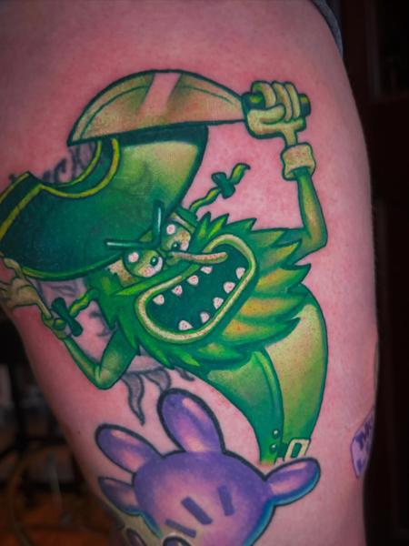 Cartoon cartoon leprechaun tattoo by @joshhermantattoo