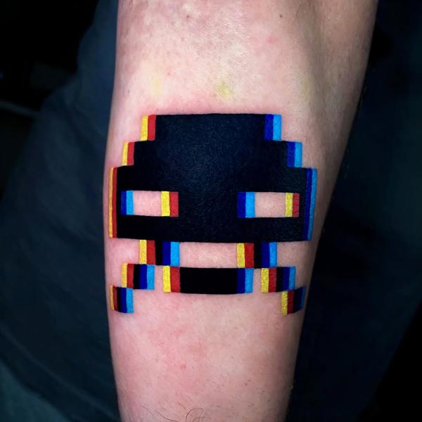 Pixel art pixelated face tattoo by @joshpeacock_obe1