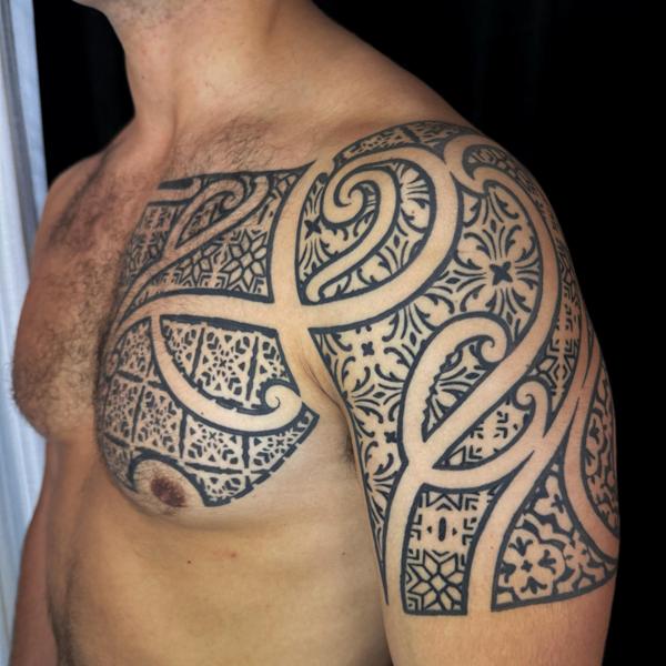 Tribal tribal pattern tattoo by @joshuaflinn