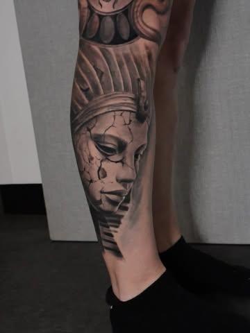 Realism cracked statue tattoo by @jl.tattooart
