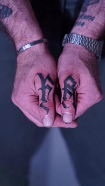 Blackwork lettering tattoo by @niorkz