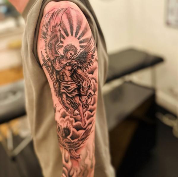 Realism archangel battle tattoo by @j_c_tattoos