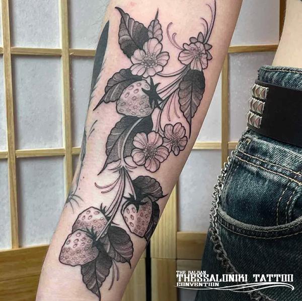 Blackwork strawberry flowers tattoo by @kalli_k_