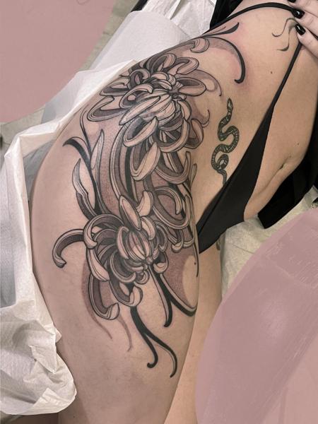 Blackwork floral snake tattoo by @kalli_k_