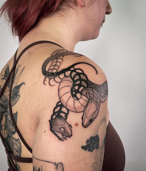 Blackwork snake heads tattoo by @kalli_k_