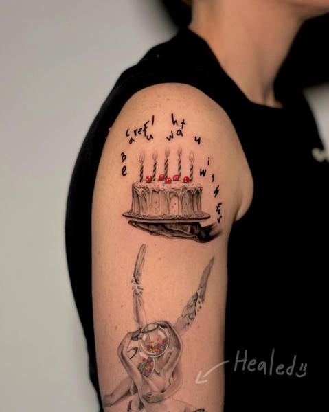 Illustrative birthday cake tattoo by @kallia_tatts