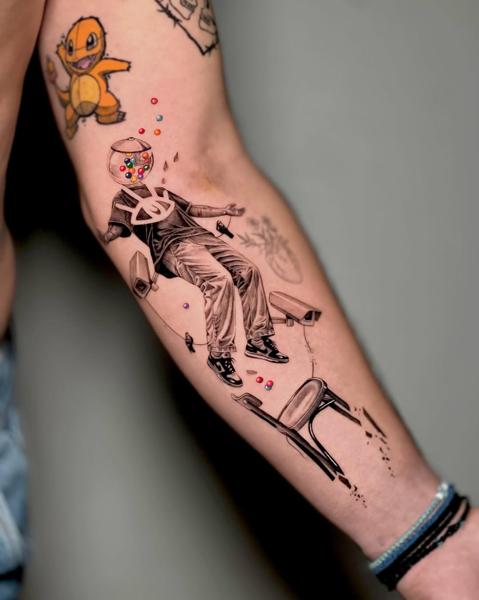 Realism gumball head figure tattoo by @kallia_tatts