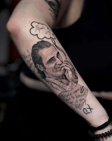 Realism smoking character tattoo by @kallia_tatts
