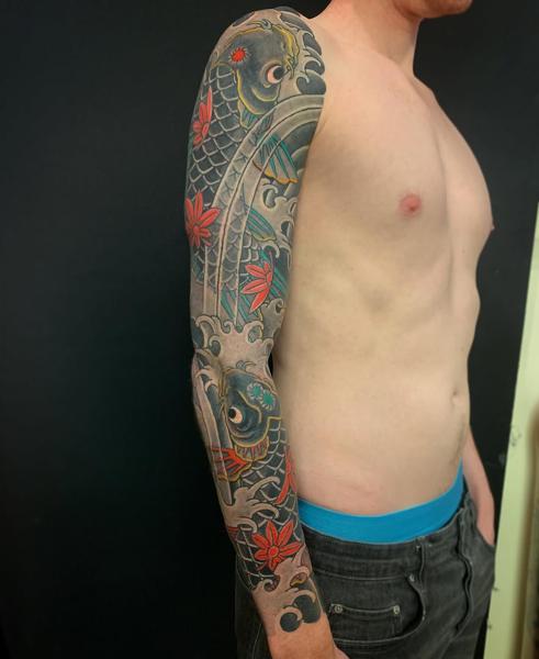 Japanese japanese koi fish tattoo by @kanae_tattooer