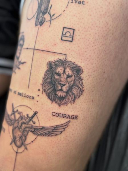 Fine line lion head tattoo by @katcorneytattoo