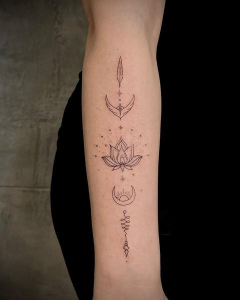 Fine line geometric lotus tattoo by @kat_blink_tattoo