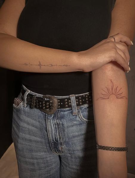 Fine line sunburst tattoo by @kat_blink_tattoo