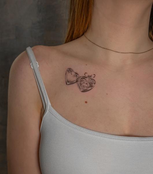 Fine line heart locket tattoo by @kat_blink_tattoo
