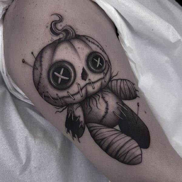 Illustrative pumpkin voodoo doll tattoo by @achlys.ttt