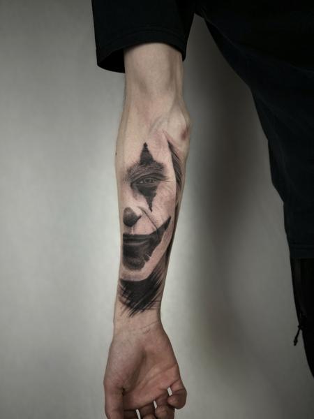 Realism clown portrait tattoo by @katia.iink