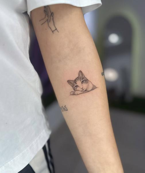 Fine line cat portrait tattoo by @katia.iink