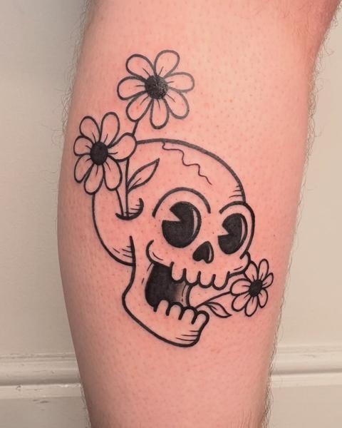 Traditional skull with flowers tattoo by @nevermind.tattoos