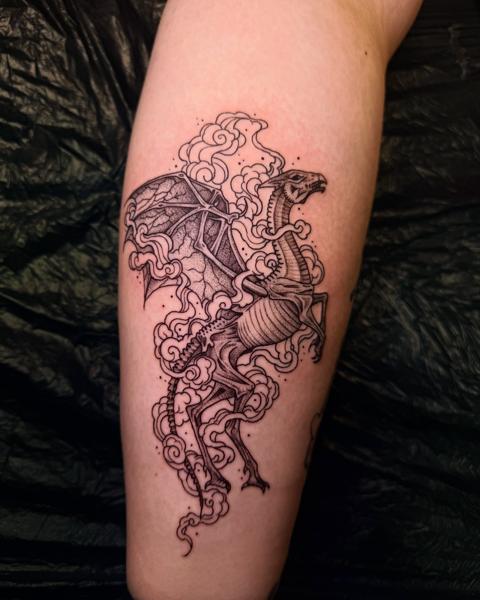 Blackwork skeletal dragon tattoo by @katwhysalltattoos