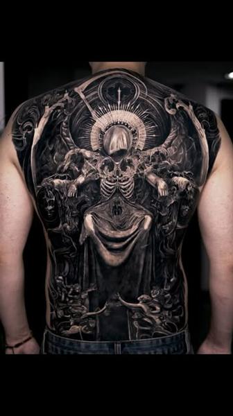 Realism skeleton throne tattoo by @kazin_tattooer