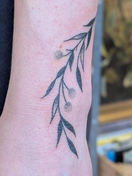 Fine line botanical branch tattoo by @kellyneedles
